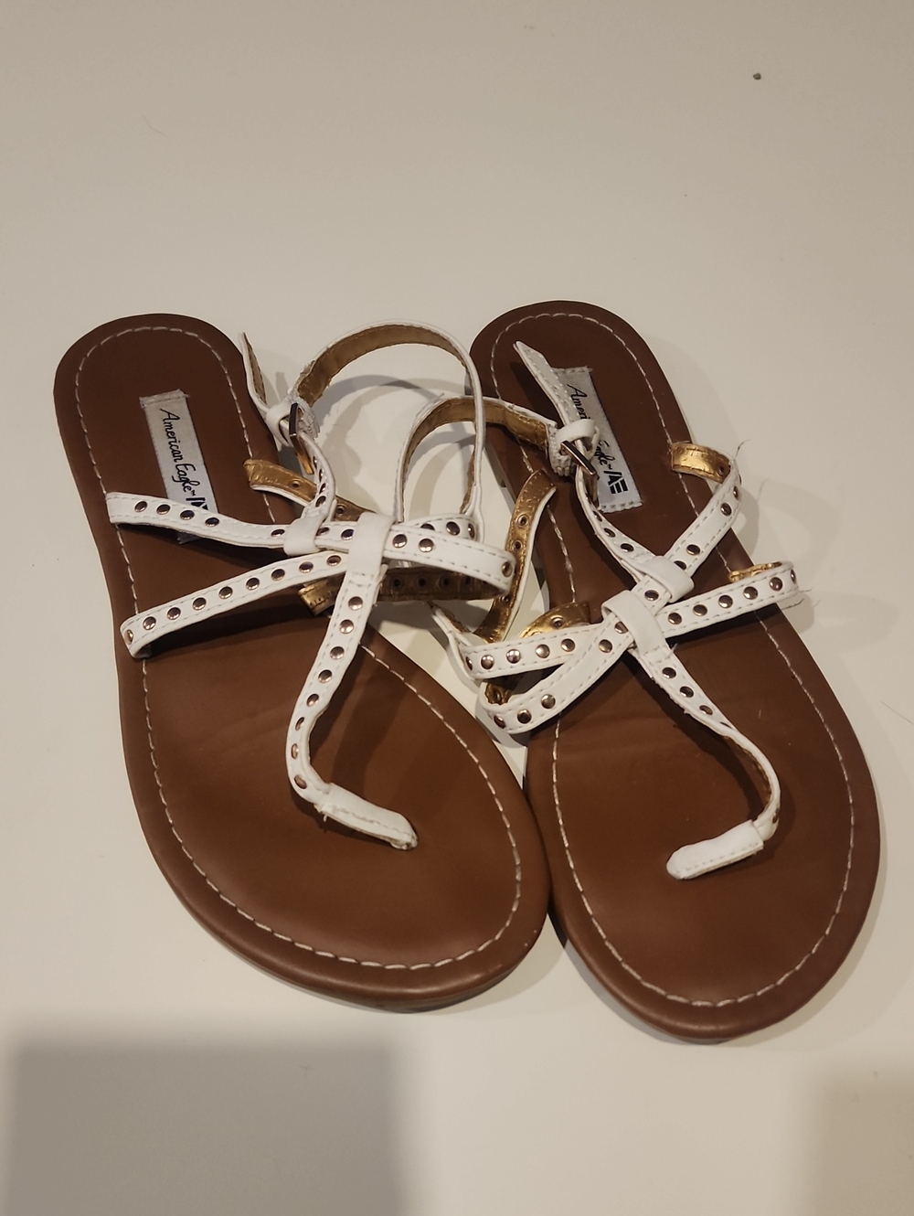 American Eagle Outfitters White and Gold Studded T-Strap Sandals